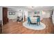 Spacious open-plan living area with dining space, bar, and multiple entertainment options at 1152 Clubhouse Dr, Broomfield, CO 80020
