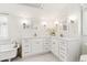 Elegant primary bath featuring double sinks, soaking tub, and modern fixtures at 428 N Humboldt St, Denver, CO 80218