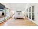 Spacious bedroom features a large window, elegant decor, and ample natural light at 428 N Humboldt St, Denver, CO 80218
