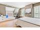 This bedroom features light walls, hardwood floors, and a built-in desk at 428 N Humboldt St, Denver, CO 80218