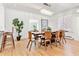 Dining room with hardwood floors and modern chandelier at 428 N Humboldt St, Denver, CO 80218