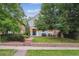 Charming home with manicured front yard and inviting entrance, set back from the street at 428 N Humboldt St, Denver, CO 80218