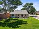 Aerial view of the backyard, patio, and well-manicured lawn of the home at 9236 Vrain Ct, Westminster, CO 80031