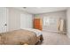 Comfortable bedroom with a large closet, wooden dresser and neutral carpet at 9236 Vrain Ct, Westminster, CO 80031