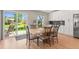 Bright dining area with sliding glass doors leading to the backyard at 9236 Vrain Ct, Westminster, CO 80031