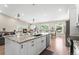 Open concept kitchen featuring granite countertops and stainless steel appliances at 9236 Vrain Ct, Westminster, CO 80031
