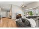 Comfortable living room with a ceiling fan and large windows at 9236 Vrain Ct, Westminster, CO 80031