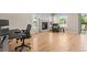 Office space with a cozy fireplace and a comfortable chair at 9236 Vrain Ct, Westminster, CO 80031