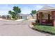 Charming home with well-manicured landscaping and a detached garage with additional community seating at 9236 Vrain Ct, Westminster, CO 80031