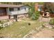 Large backyard with deck, patio, and chicken coop, perfect for relaxing or entertaining at 330 Johnson Dr, Castle Rock, CO 80104