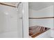 Bathroom with a shower on the left and a sunken jacuzzi tub on the right at 330 Johnson Dr, Castle Rock, CO 80104