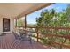 Relaxing deck area features outdoor seating, a beautiful tree and serene views at 330 Johnson Dr, Castle Rock, CO 80104