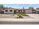 Charming ranch-style home featuring a manicured yard, brick accents, and a convenient two-car garage at 330 Johnson Dr, Castle Rock, CO 80104