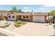 Charming single-story home with a well-manicured front yard and attached garage at 330 Johnson Dr, Castle Rock, CO 80104