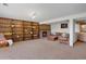 Spacious living room with a brick fireplace, built-in shelves, and comfortable seating at 330 Johnson Dr, Castle Rock, CO 80104