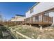 Backyard with deck and mature landscaping at 4105 N Dunkirk Ct, Denver, CO 80249