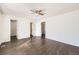 Bright bedroom with hard wood floors and neutral paint at 4105 N Dunkirk Ct, Denver, CO 80249