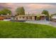 Expansive backyard with a large deck, perfect for outdoor entertaining and relaxation at 6013 S Logan St, Centennial, CO 80121