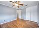 Bedroom with hardwood floors, closet, and a ceiling fan at 6013 S Logan St, Centennial, CO 80121