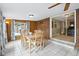 Cozy dining room with wood paneling and natural light at 6013 S Logan St, Centennial, CO 80121