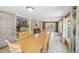 Spacious dining room with brick accent walls and ample natural light at 6013 S Logan St, Centennial, CO 80121