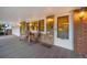 Inviting front porch showcasing a decorative glass door and brick accents at 6013 S Logan St, Centennial, CO 80121