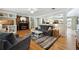 Comfortable living room featuring a fireplace, hardwood floors, and modern furnishings at 6013 S Logan St, Centennial, CO 80121
