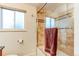 Updated bathroom with shower/tub combo and stylish tile at 7024 E Montana Pl, Denver, CO 80224