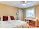 Bedroom with hardwood floors and a ceiling fan at 7024 E Montana Pl, Denver, CO 80224