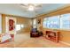 Bright living room with hardwood floors and view into kitchen at 7024 E Montana Pl, Denver, CO 80224