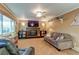 Living room features a fireplace and built-in shelving at 7024 E Montana Pl, Denver, CO 80224