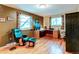 Home office with hardwood floors and built-in desk at 7024 E Montana Pl, Denver, CO 80224