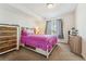 Cozy bedroom with plush carpet, white furniture, and curtains allowing natural light to filter in at 19047 Randolph Pl, Denver, CO 80249