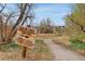 A welcome sign marks the entrance to the First Creek exploration play zone at 19047 Randolph Pl, Denver, CO 80249