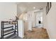 Upstairs hallway leads to bedrooms; bright with natural light at 19047 Randolph Pl, Denver, CO 80249