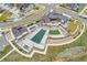 Aerial view of community pool, grilling area, and lounging areas at 19047 Randolph Pl, Denver, CO 80249
