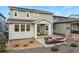 Inviting backyard patio with comfortable seating, a fire pit, and a charming pergola for relaxing outdoors at 8480 Arriba Dr, Littleton, CO 80125
