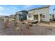 Spacious backyard featuring a patio area with outdoor seating, perfect for entertaining and enjoying the outdoors at 8480 Arriba Dr, Littleton, CO 80125
