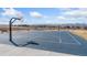Community basketball court with mountain views in the background at 8480 Arriba Dr, Littleton, CO 80125