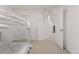 ' bedroom with a bunk bed; storage space in the background, and plush carpeting at 8480 Arriba Dr, Littleton, CO 80125