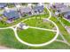 Aerial shot of a community park featuring a circular walkway, gazebo, and green space at 8480 Arriba Dr, Littleton, CO 80125