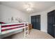 bedroom with loft bed and ample closet space at 11455 River Run Pkwy, Commerce City, CO 80640