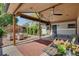 Covered back patio with seating area and ceiling fan at 9400 Ridge Rd, Arvada, CO 80002