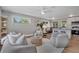 Open living room with modern furnishings, including comfortable seating and lots of natural light at 9400 Ridge Rd, Arvada, CO 80002