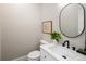 Contemporary powder room includes a modern vanity, sleek sink, and updated fixtures at 1050 N Clarkson St, Denver, CO 80218