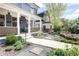 Charming blue home featuring a landscaped front yard, welcoming front porch and updated facade at 1050 N Clarkson St, Denver, CO 80218