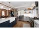 Modern kitchen featuring a large island, stainless steel appliances, and open layout at 1050 N Clarkson St, Denver, CO 80218