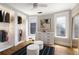 Well-lit walk-in closet with custom shelving, dresser and storage, providing ample space at 1050 N Clarkson St, Denver, CO 80218