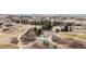 Aerial view of the gate to the golf course community and surrounding landscape at 1039 Buffalo Ridge Way, Castle Pines, CO 80108