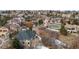 Aerial view of a neighborhood with diverse housing styles and lush landscaping at 1039 Buffalo Ridge Way, Castle Pines, CO 80108